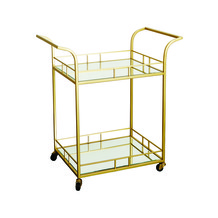Gouden trolly met spiegel