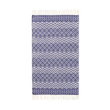 Blauw en wit tapijt