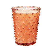 Kaars in oranje glaasje