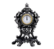 Zwart en zilveren klok