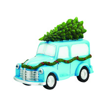 Blauwe auto met boom