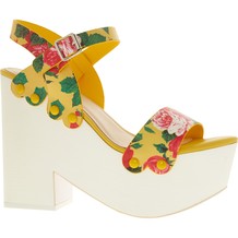 Gele platform hak met bloemen