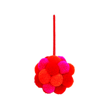 Rood en roze pom pom bal