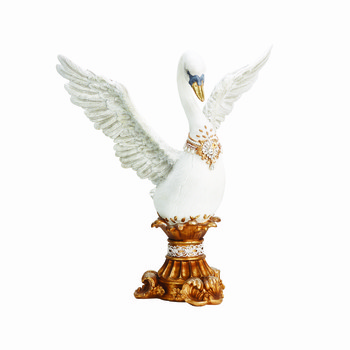 Wit en goud standbeeld van een zwaan